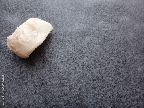white rock on textured background
