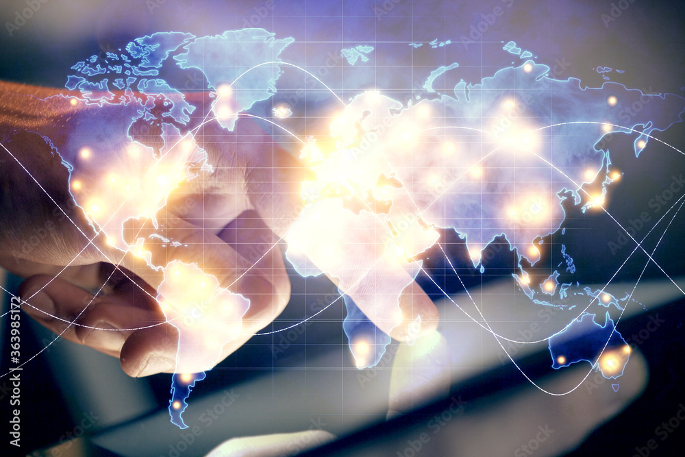 Fototapeta premium Double exposure of man's hands holding and using a phone and international business theme drawing.