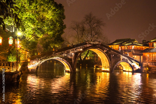 Fototapeta Naklejka Na Ścianę i Meble -  Wuzhen,Tongxiang city,Zhejiang province,Chine.01,21,2018. The night view of ancient town,Wuzhen, is a famous historical,cultural and traditional water town.