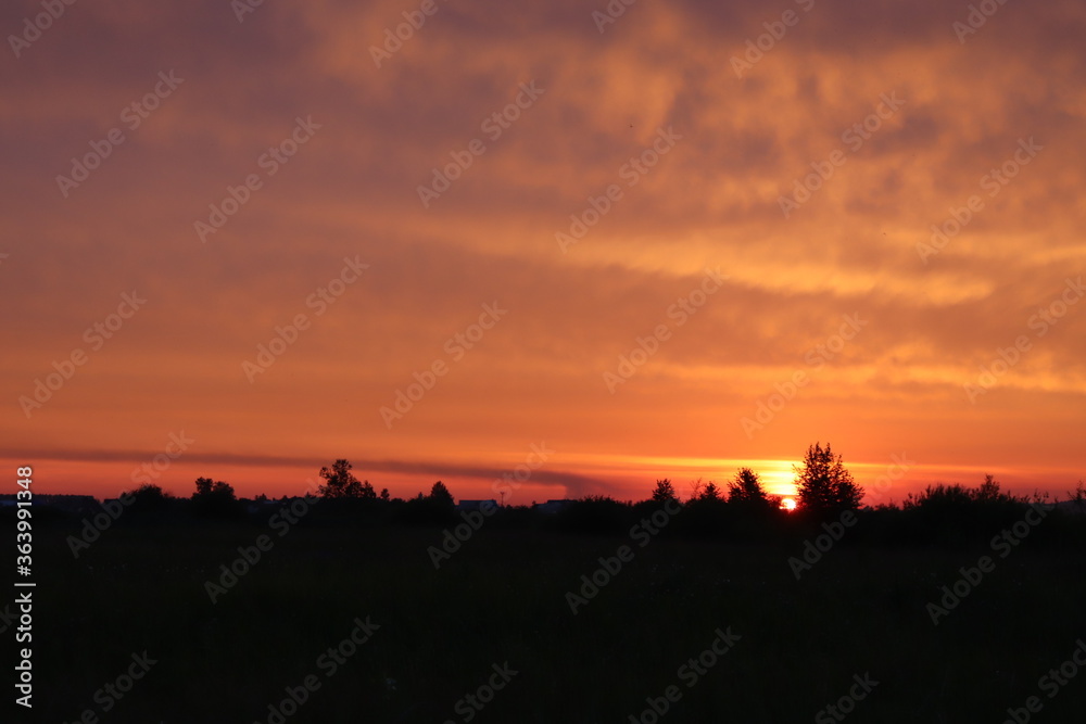 silhouette of a man walking on the sunset