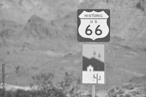 Oatman Sign, a Wild West Ghost Town in black and white. On U.S. Route 66 in the Black Mountain Range of the Sonoran Desert, Arizona USA