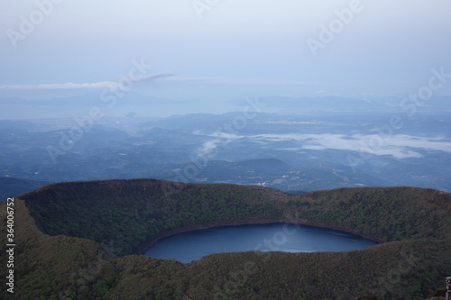 Onami-lake(old crater) in Kirishima mountain range in the early morning, Miyazaki, Japan photo