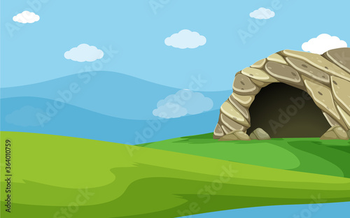 Empty nature scenes with green meadow and stone cave and blank blue sky