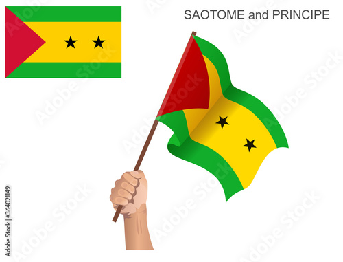 State flag of Sao Tome and Principe raised with a stick held by hand to inflame the spirit of statehood