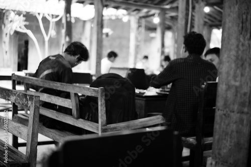 Some people in coffee shops © azzar