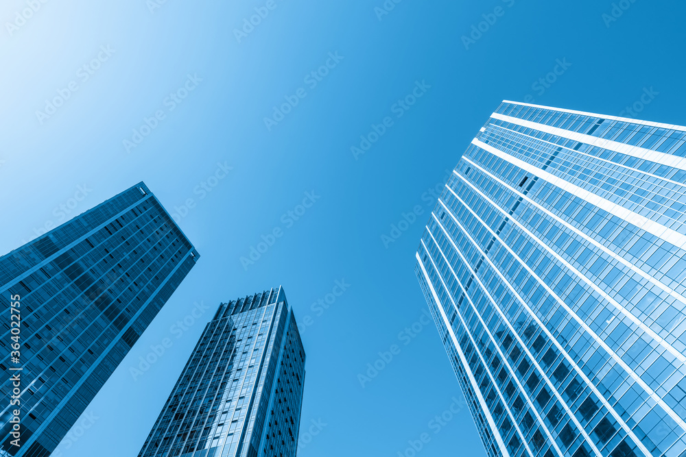 Looking Up Blue Modern Office Building