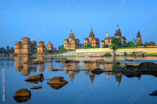 View of Royal cenotaphs (Chhatris) of Orchha over Betwa river. Orchha, Madhya Pradesh, India.