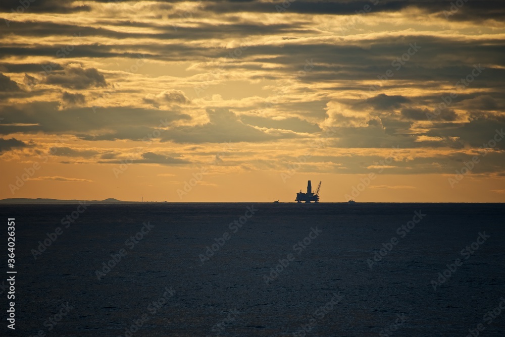 Sakhalin island. Drilling platform at sea. Fall. Around the icy water of the Sea of Okhotsk.