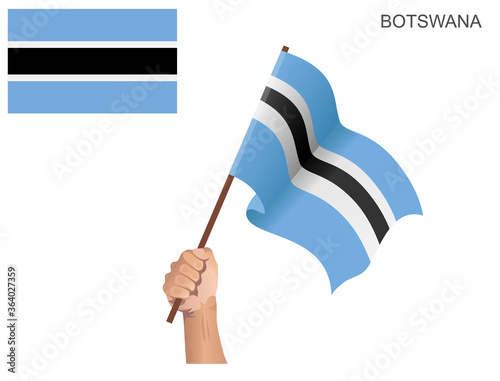 The flag of the country of Botswana that is hoisted with a stick held by hand to ignite the spirit of statehood