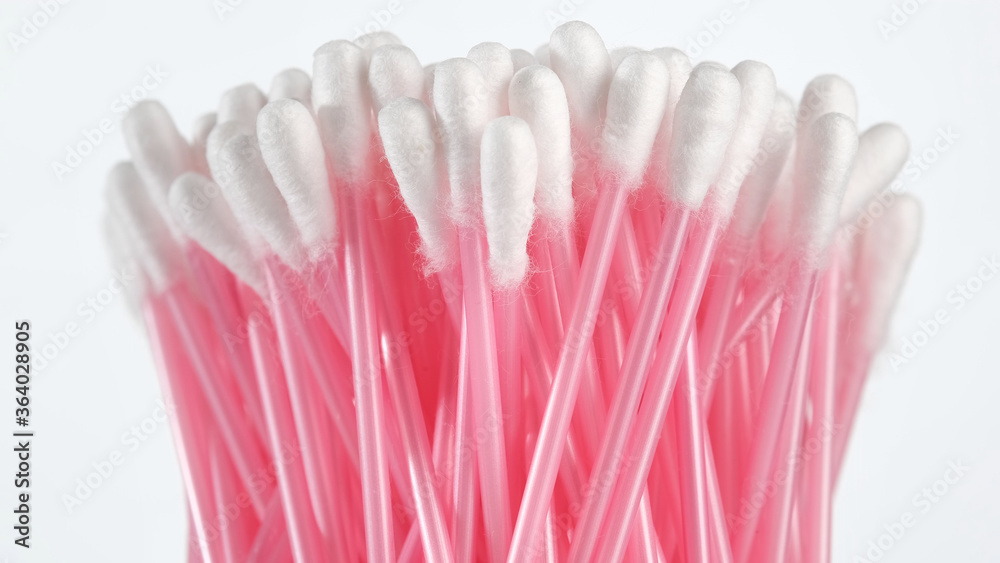 rotating cotton buds on white background rotating cotton buds on white background