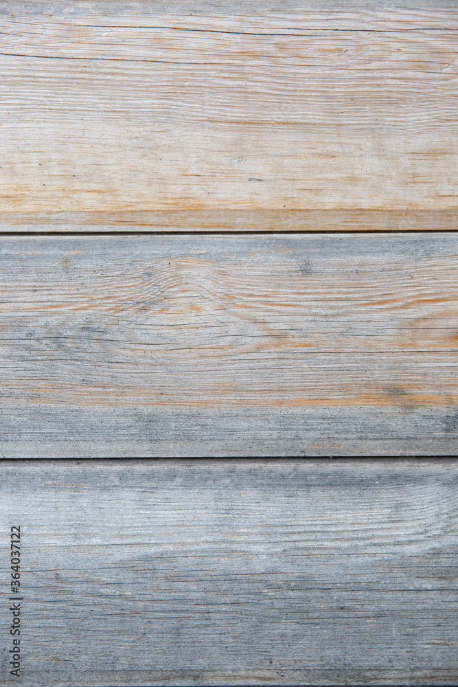 Fototapeta premium vertical wood texture background surface with natural pattern. Rustic wooden table or floor top view.