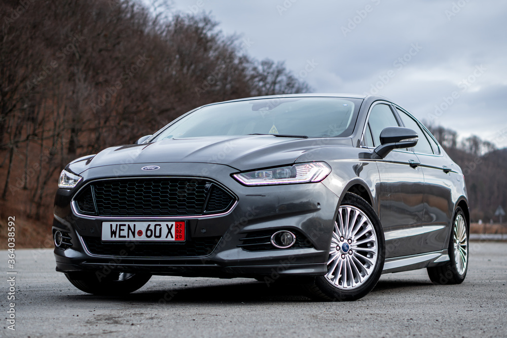 Cluj-Napoca,Cluj/Romania-01.31.2020-Ford Mondeo MK5 Sport edition with  dynamic led headlights, sport front bumper, 18 inch alloy wheels, Aston  Martin look a like Stock Photo