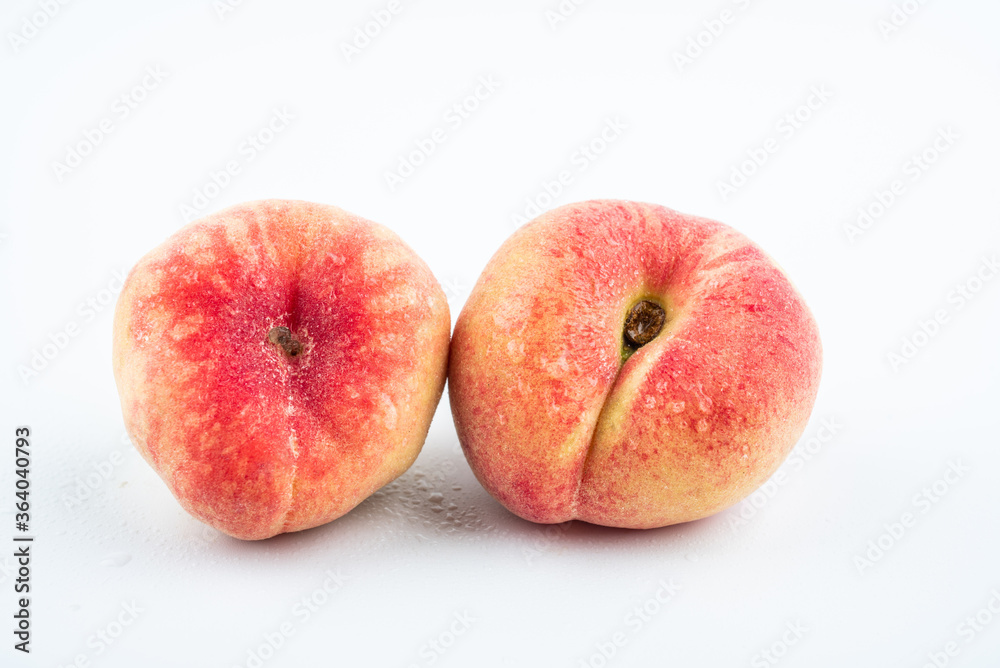 Two fresh fruits flat peach on white background Two fresh fruits flat peach on white background