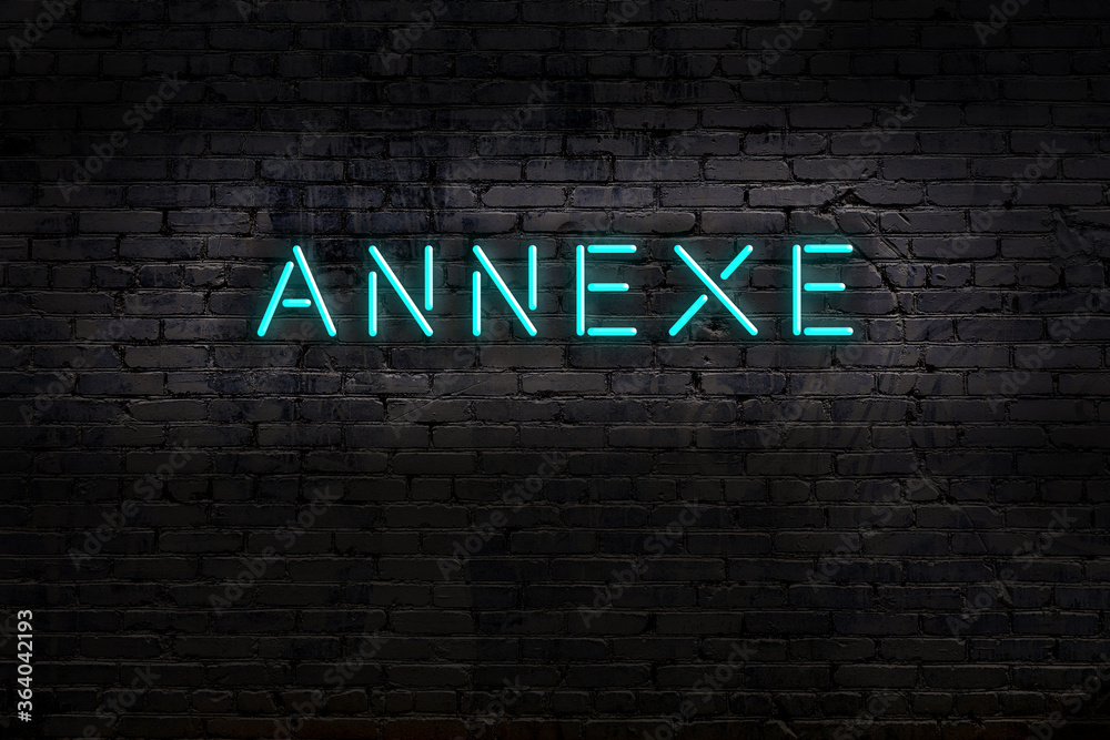 Night view of neon sign on brick wall with inscription annexe - obrazy, fototapety, plakaty 