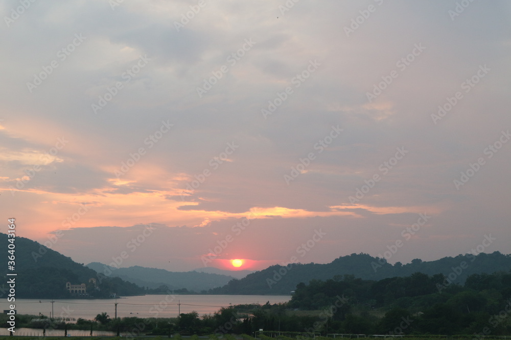 Thai vineyards during sunset with mountain and river view