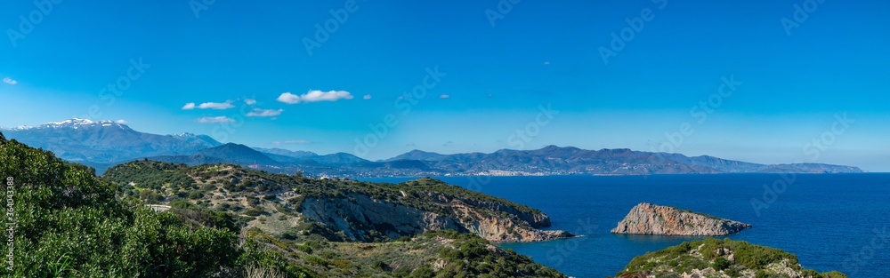 Panoramic bird eye view of Aegean sea in Crete island, Greece. HD panorama blue sky and Cretan sea. Greek nature.