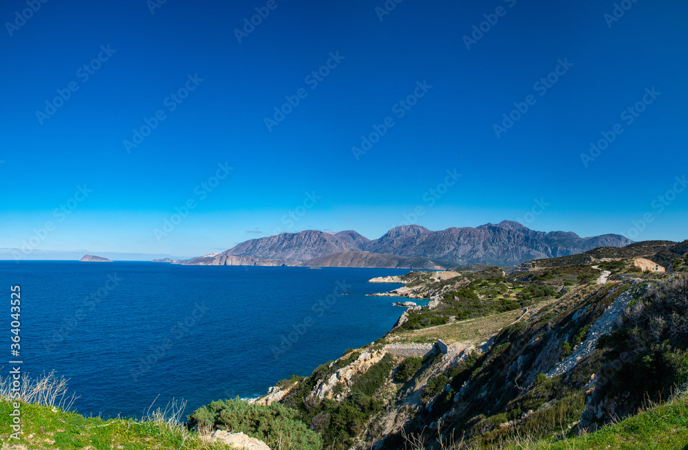 Panoramic bird eye view of Aegean sea in Crete island, Greece. HD panorama blue sky and Cretan sea. Greek nature.