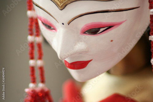 Close up of wayang golek or puppet show characters is one of a variety of puppet arts made of wood. photo