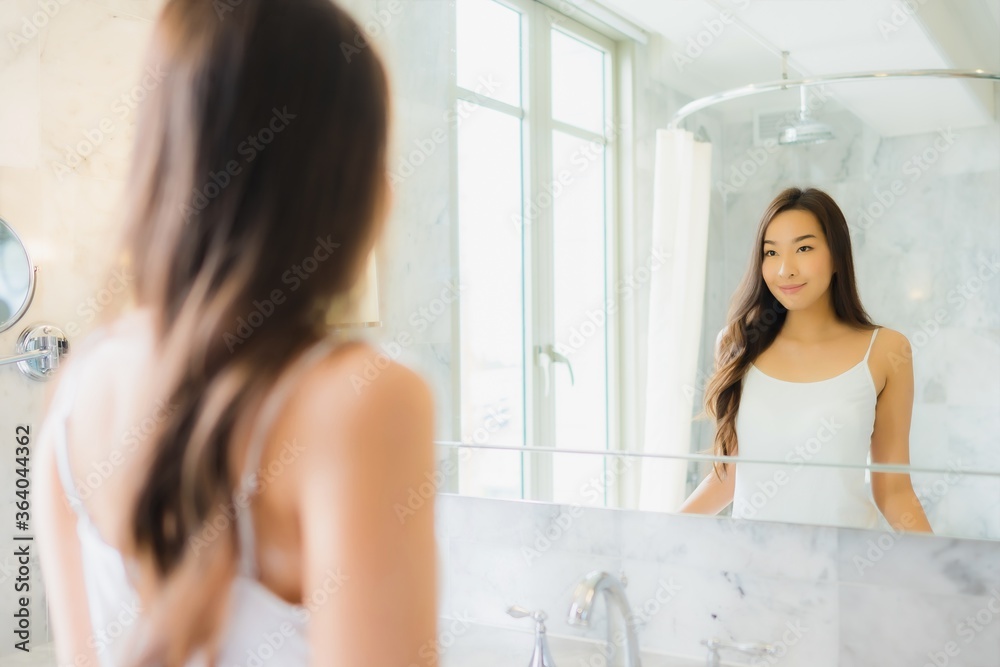 Portrait beautiful young asian woman check up and make up her face Portrait beautiful young asian woman check up and make up her face
