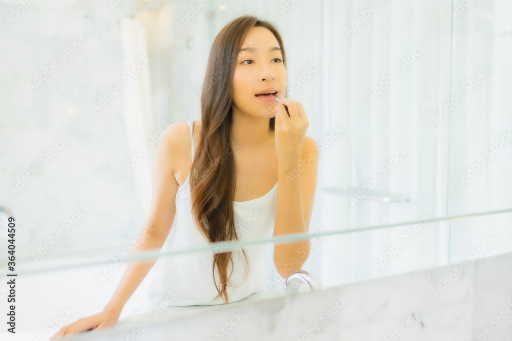Portrait beautiful young asian woman check up and make up her face Portrait beautiful young asian woman check up and make up her face