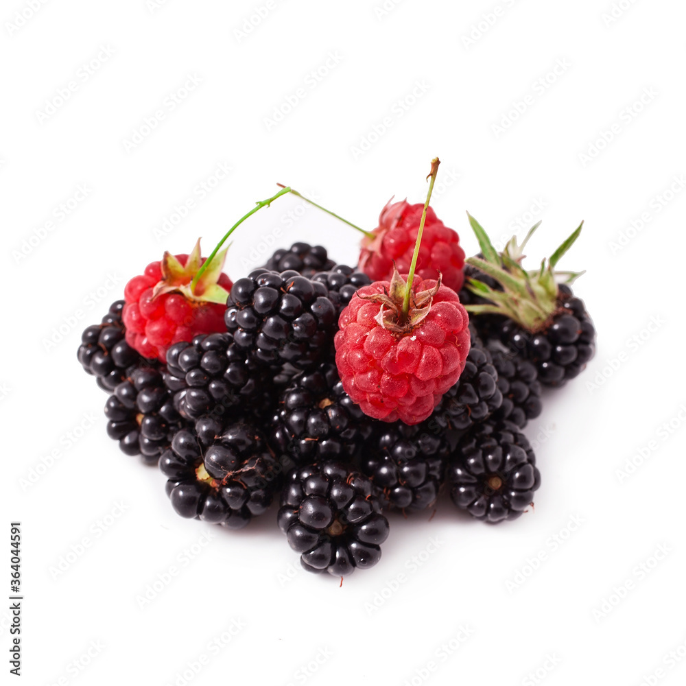 Blackberries and raspberries isolated on a white background. Blackberries and raspberries isolated on a white background.