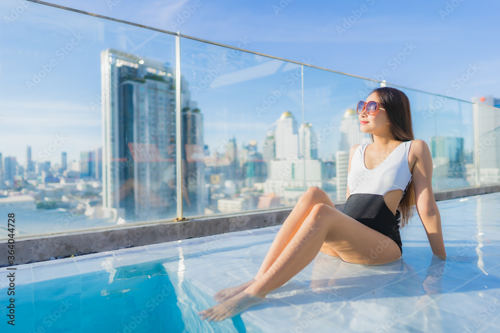 Portrait beautiful young asian woman relax leisure around swimming pool