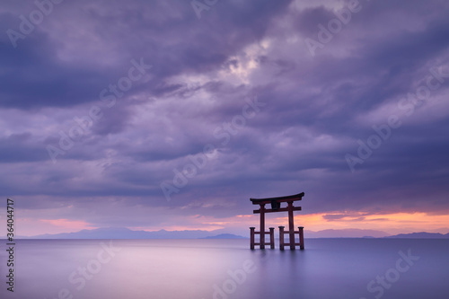 Long exposure shot of Shirahige shrine Torii gate at sunrise, Lake Biwa, Shiga Prefecture, Japan