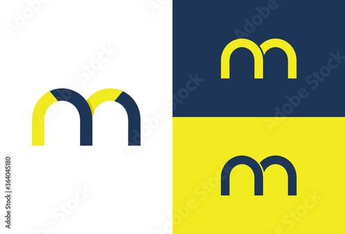 Letter m logo design.Typographic.Yellow and dark blue colors are used.Logo for a food restaurant.Luxury.Elegant.Clean and simple.