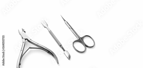 фотографія Close-up manicure and pedicure nail care tools set isolated on white background with selective focus and copy space