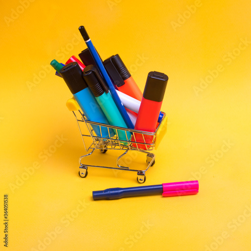 Shopping cart with colorful stationery 