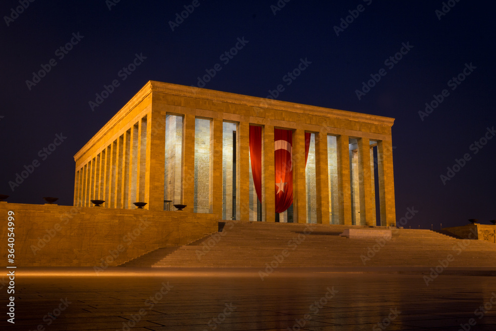 Fototapeta premium Mustafa Kemal Ataturk`s (founder and first President of Turkish Republic) Mausoleum, Anitkabir, with Turkish flag in Ankara, Turkey, by night.