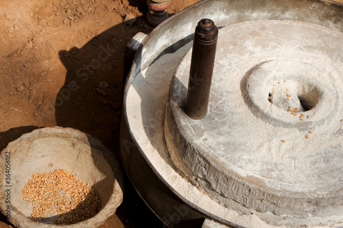 Hard stone wheel used in villages for grinding wheat  and other grain seeds