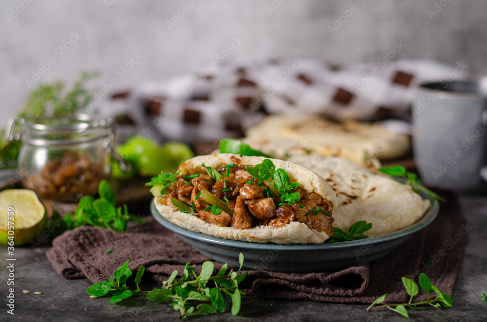Homemade pita bread with meat and herbs Homemade pita bread with meat and herbs