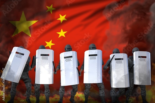 Bilde på lerret China protest stopping concept, police swat in heavy smoke and fire protecting c