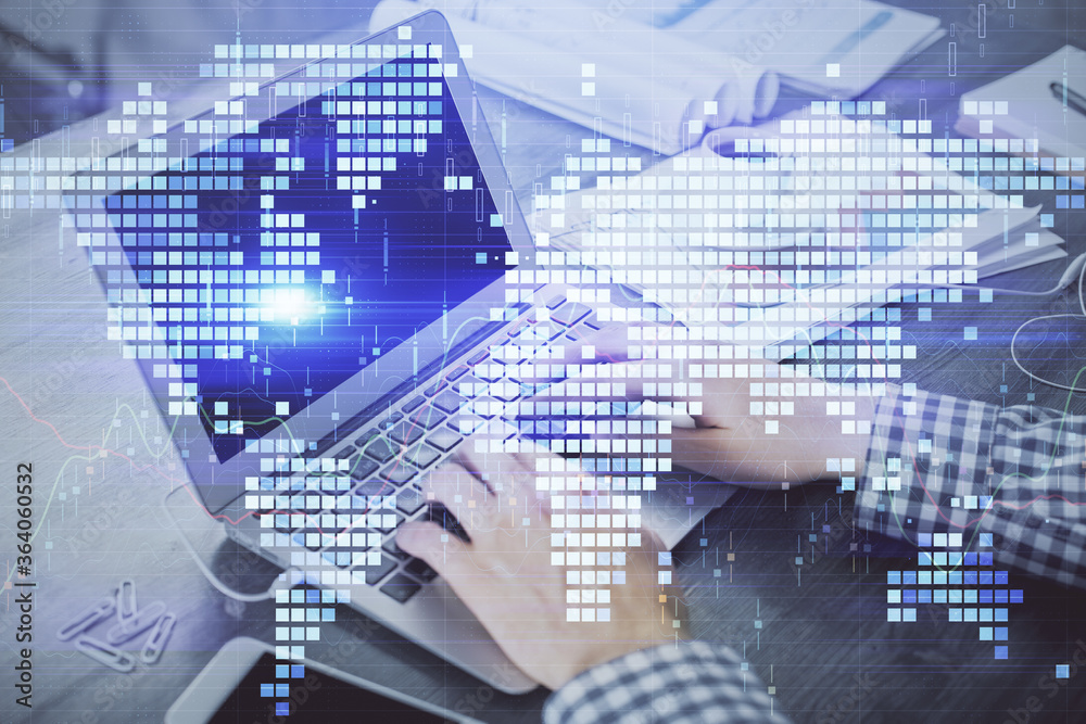 Obraz premium Multi exposure of businessman working on laptop on background. International business hologram in front. Concept of success.