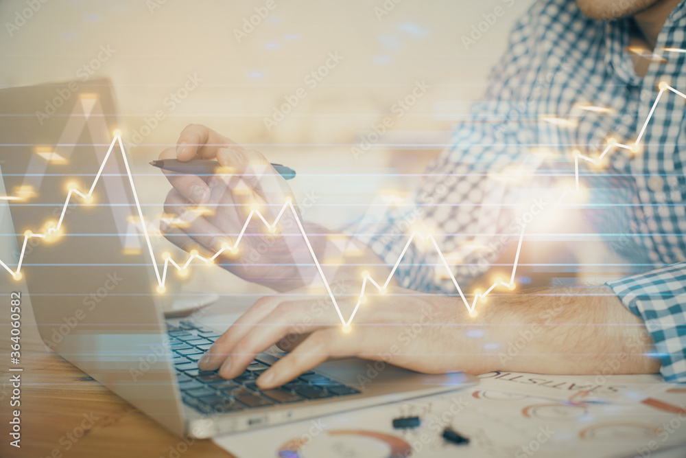 Multi exposure of forex graph with man working on computer on background. Concept of market analysis. Multi exposure of forex graph with man working on computer on background. Concept of market analysis.