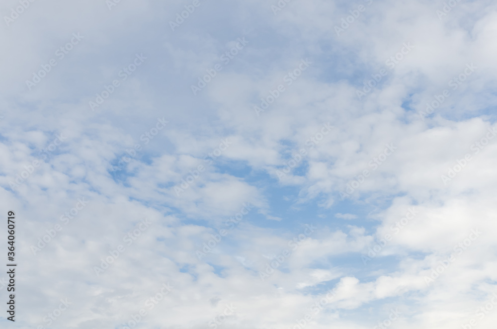 white fluffy clouds in the blue sky, Blue sky background with tiny clouds