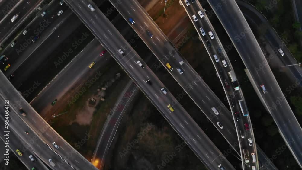 Intersection transport road with truck and car busy traffic at night with road light aerial view Intersection transport road with truck and car busy traffic at night with road light aerial view