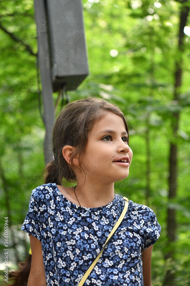 beautiful girl on a playground in a leisure park beautiful girl on a playground in a leisure park
