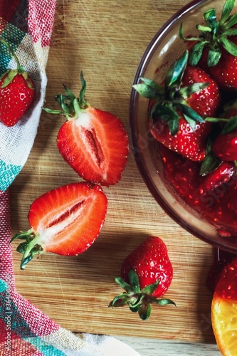 Food art. Tasty composition with strawberry and jam. Sweet summer taste