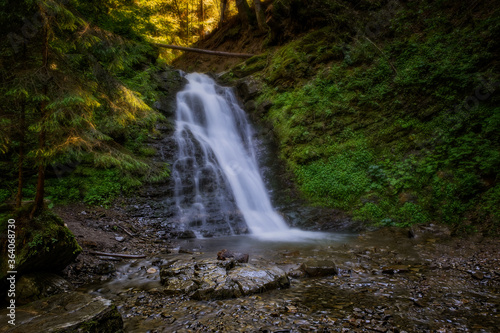 Sopit or Sopot waterfall is located in Ukrainian Carpathians at the summer times, july 2020. Long exposure shot.