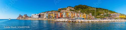 A panorama view across the harbour and town of Porto Venere, Italy in the summertime