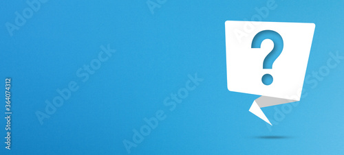 Question mark with speech bubble on blue background