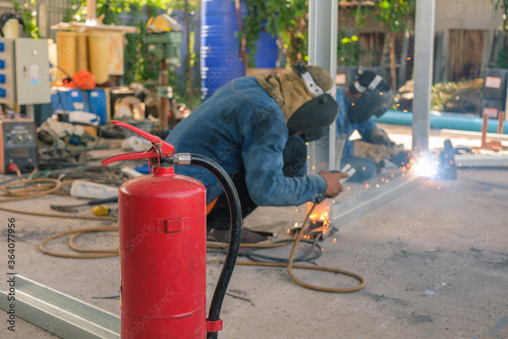 Fire extinguisher are used to prevent fire in welding steel work. Stock
