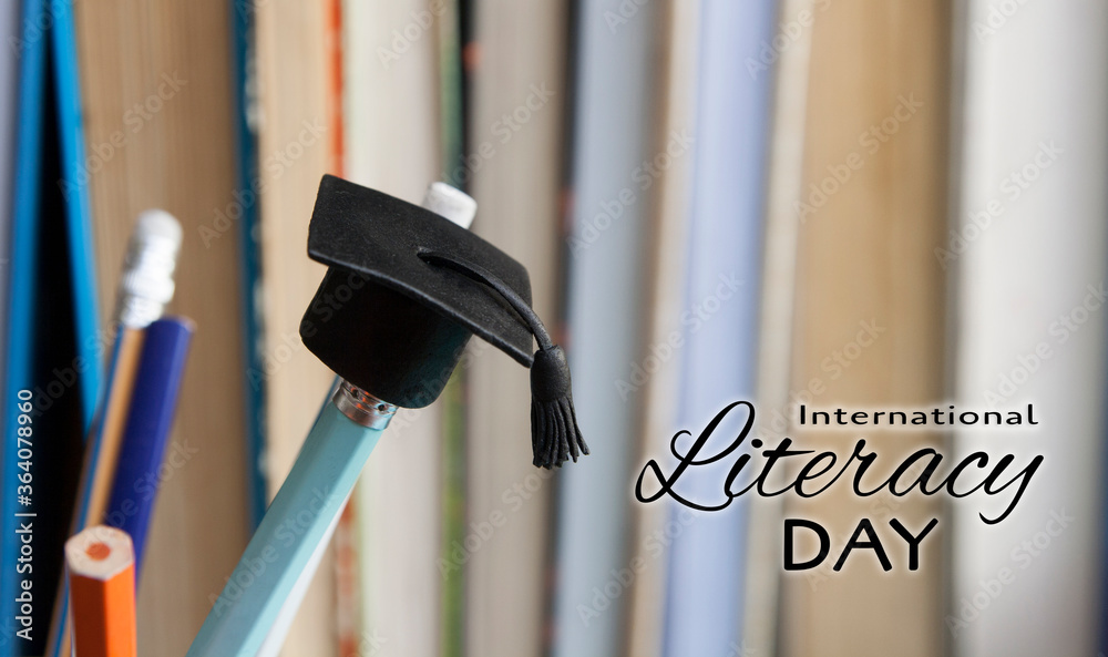 International literacy day concept with a graduate hat on pencil International literacy day concept with a graduate hat on pencil