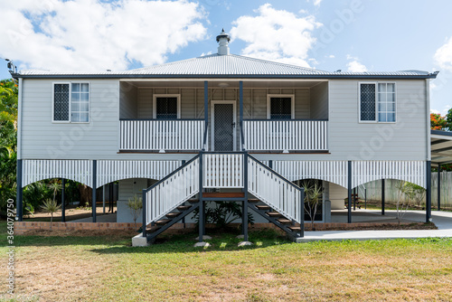 Renovated traditional Queensland high set house with double stairway