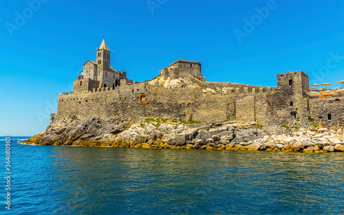 A view towards the church of Saint Peter in Porto Venere  Italy in the summertime