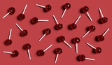 brown lollipops on a red background 3d render
