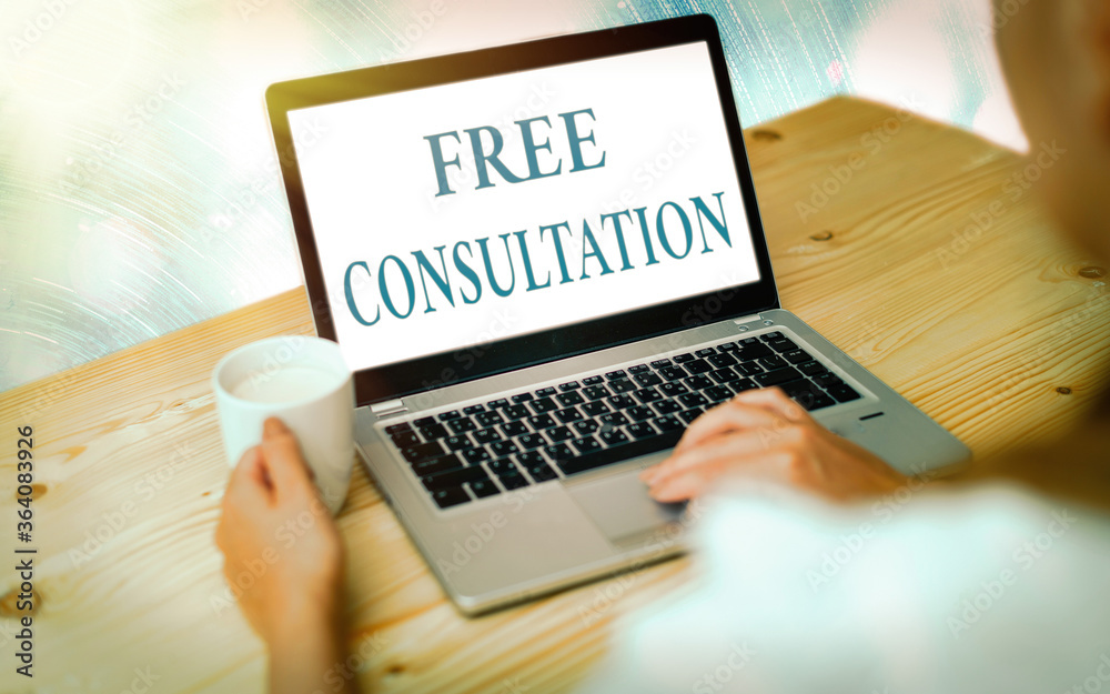Handwriting text writing Free Consultation. Conceptual photo a meeting to discuss something or to get advice for free Modern gadgets with white display screen under colorful bokeh background