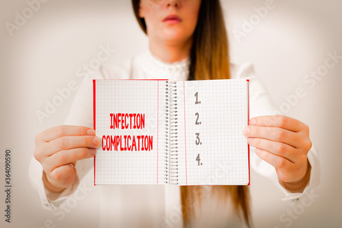 Word writing text Infection Complication. Business photo showcasing unwanted reaction resulted from an immunosuppression Model displaying different empty color notepad mock-up for writing idea photo